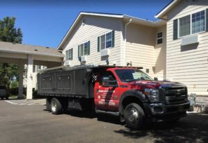 A Commercial White Gutter Installation by Affordable Roofing & Gutter Company in Albany, Oregon