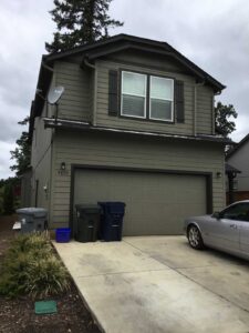 A Residential Forest Green Gutter Installation by Affordable Roofing & Gutter Company in Albany, Oregon