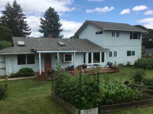 A Residential White Gutter Installation by Affordable Roofing & Gutter Company in Albany, Oregon