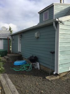 A Residential White Gutter Installation by Affordable Roofing & Gutter Company in Albany, Oregon