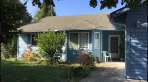 A Residential White Gutter Installation by Affordable Roofing & Gutter Company in Albany, Oregon