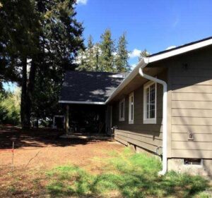 A Residential White Gutter Installation by Affordable Roofing & Gutter Company in Albany, Oregon