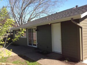 A Residential White Gutter Installation by Affordable Roofing & Gutter Company in Albany, Oregon