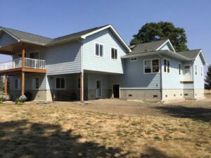 A Residential White Gutter Installation by Affordable Roofing & Gutter Company in Albany, Oregon