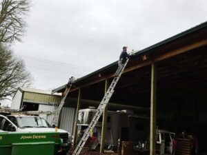 A Residential Forest Green Gutter Installation by Affordable Roofing & Gutter Company in Corvallis, Oregon