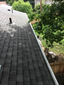 A Residential White Gutter Guard Installation by Affordable Roofing & Gutter Company in Eugene, Oregon