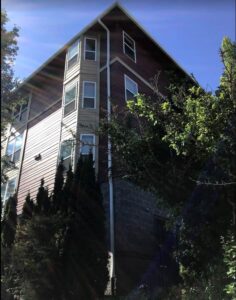 A Commercial White Gutter Installation by Affordable Roofing & Gutter Company in Eugene, Oregon