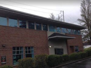 A Commercial White Gutter Installation by Affordable Roofing & Gutter Company in Eugene, Oregon