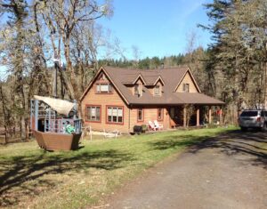 A Residential Chocolate Brown Gutter Installation by Affordable Roofing & Gutter Company in Eugene, Oregon