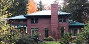 A Residential Forest Green Gutter Installation by Affordable Roofing & Gutter Company in Eugene, Oregon