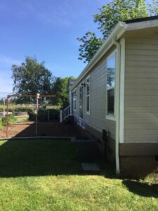 A Residential White Gutter Installation by Affordable Roofing & Gutter Company in Eugene, Oregon