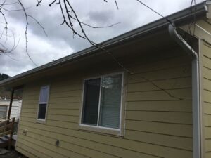 A Residential White Gutter Installation by Affordable Roofing & Gutter Company in Eugene, Oregon