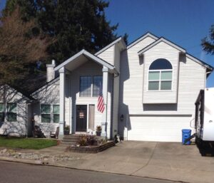 A Residential White Gutter Installation by Affordable Roofing & Gutter Company in Eugene, Oregon