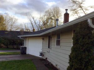 A Residential White Gutter Installation by Affordable Roofing & Gutter Company in Eugene, Oregon