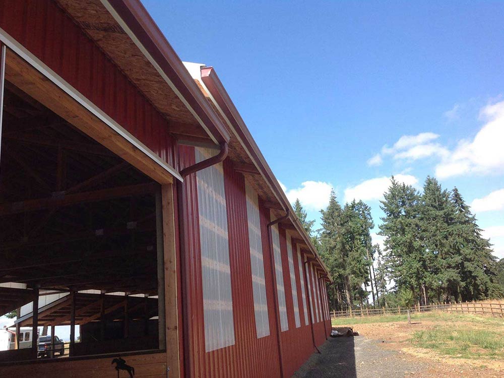 Farm Building Gutter installations in Oregon by Affordable Roofing & Gutter Company.