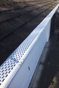 A Residential White Gutter Guard Installation by Affordable Roofing & Gutter Company in Lebanon, Oregon