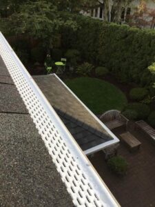 A Residential White Gutter Guard Installation by Affordable Roofing & Gutter Company in Lebanon, Oregon