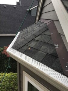 A Residential White Gutter Guard Installation by Affordable Roofing & Gutter Company in Lebanon, Oregon