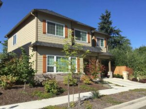 A Residential Cream Gutter Installation by Affordable Roofing & Gutter Company in Lebanon, Oregon