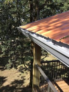 A Residential Harbor Grey Gutter Installation by Affordable Roofing & Gutter Company in Lebanon, Oregon