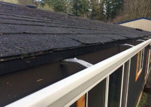 A Residential White Gutter Installation by Affordable Roofing & Gutter Company in Lebanon, Oregon