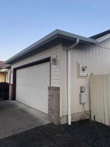 A Residential White Gutter Installation by Affordable Roofing & Gutter Company in Lebanon, Oregon