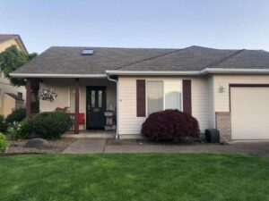 A Residential White Gutter Installation by Affordable Roofing & Gutter Company in Lebanon, Oregon