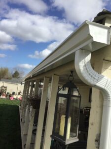 A Residential White Gutter Installation by Affordable Roofing & Gutter Company in Lebanon, Oregon