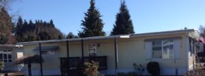 A Residential White Gutter Installation by Affordable Roofing & Gutter Company in Lebanon, Oregon