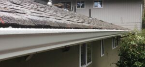 A Residential White Gutter Installation by Affordable Roofing & Gutter Company in Lebanon, Oregon