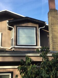 A Residential White Gutter Installation by Affordable Roofing & Gutter Company in Lebanon, Oregon