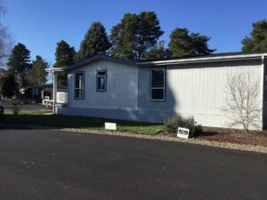 A Residential White Gutter Installation by Affordable Roofing & Gutter Company in Lebanon, Oregon