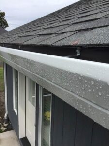 A Residential White Gutter Installation by Affordable Roofing & Gutter Company in Lebanon, Oregon