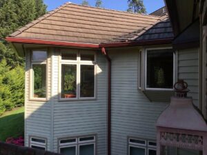 A Residential Colonial Red Gutter Installation by Affordable Roofing & Gutter Company in Portland, Oregon