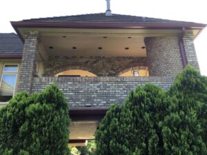 A Residential Colonial Red Gutter Installation by Affordable Roofing & Gutter Company in Portland, Oregon