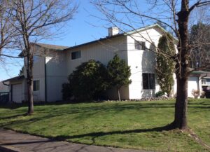 A Residential Forest Green Gutter Installation by Affordable Roofing & Gutter Company in Portland, Oregon