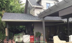 A Residential Pebble Stone Clay Gutter Installation by Affordable Roofing & Gutter Company in Portland, Oregon