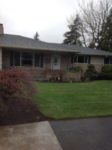 A Residential Pebble Stone Clay Gutter Installation by Affordable Roofing & Gutter Company in Portland, Oregon