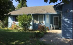 A Residential White Gutter Installation by Affordable Roofing & Gutter Company in Portland, Oregon