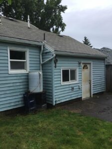 A Residential White Gutter Installation by Affordable Roofing & Gutter Company in Portland, Oregon