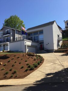 A Residential White Gutter Installation by Affordable Roofing & Gutter Company in Portland, Oregon