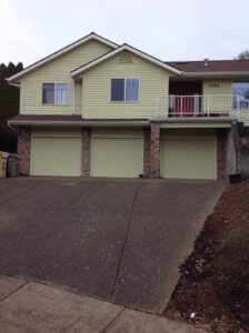 A Residential White Gutter Installation by Affordable Roofing & Gutter Company in Portland, Oregon