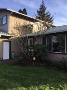 A Residential White Gutter Installation by Affordable Roofing & Gutter Company in Portland, Oregon