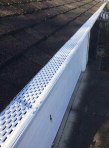 A Residential White Gutter Guard Installation by Affordable Roofing & Gutter Company in Salem, Oregon