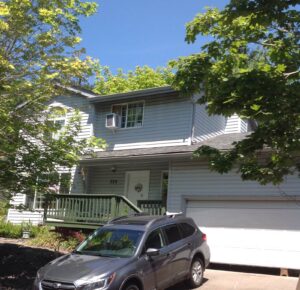 A Residential Harbor Grey Gutter Installation by Affordable Roofing & Gutter Company in Salem, Oregon