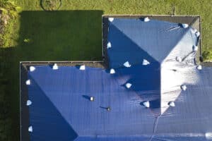 roof damage with tarp